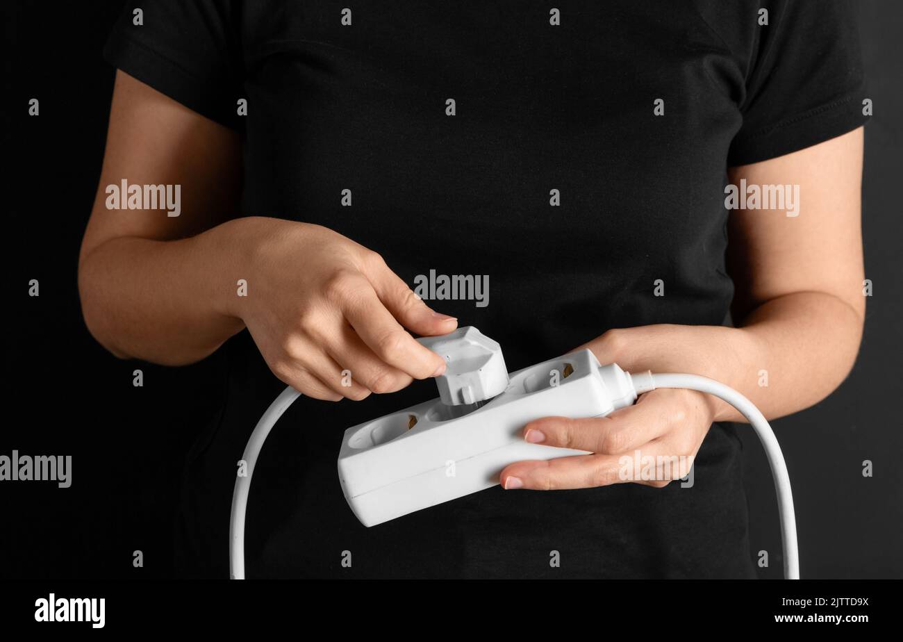 Inserting plug socket hi-res stock photography and images - Alamy