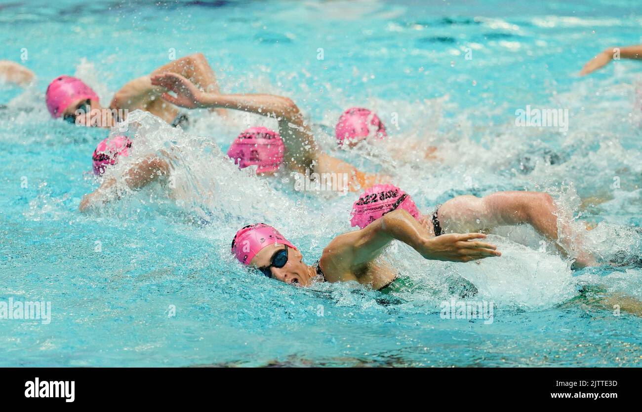 Athletes participate in heat one of the Boys Triathlon on Day One of