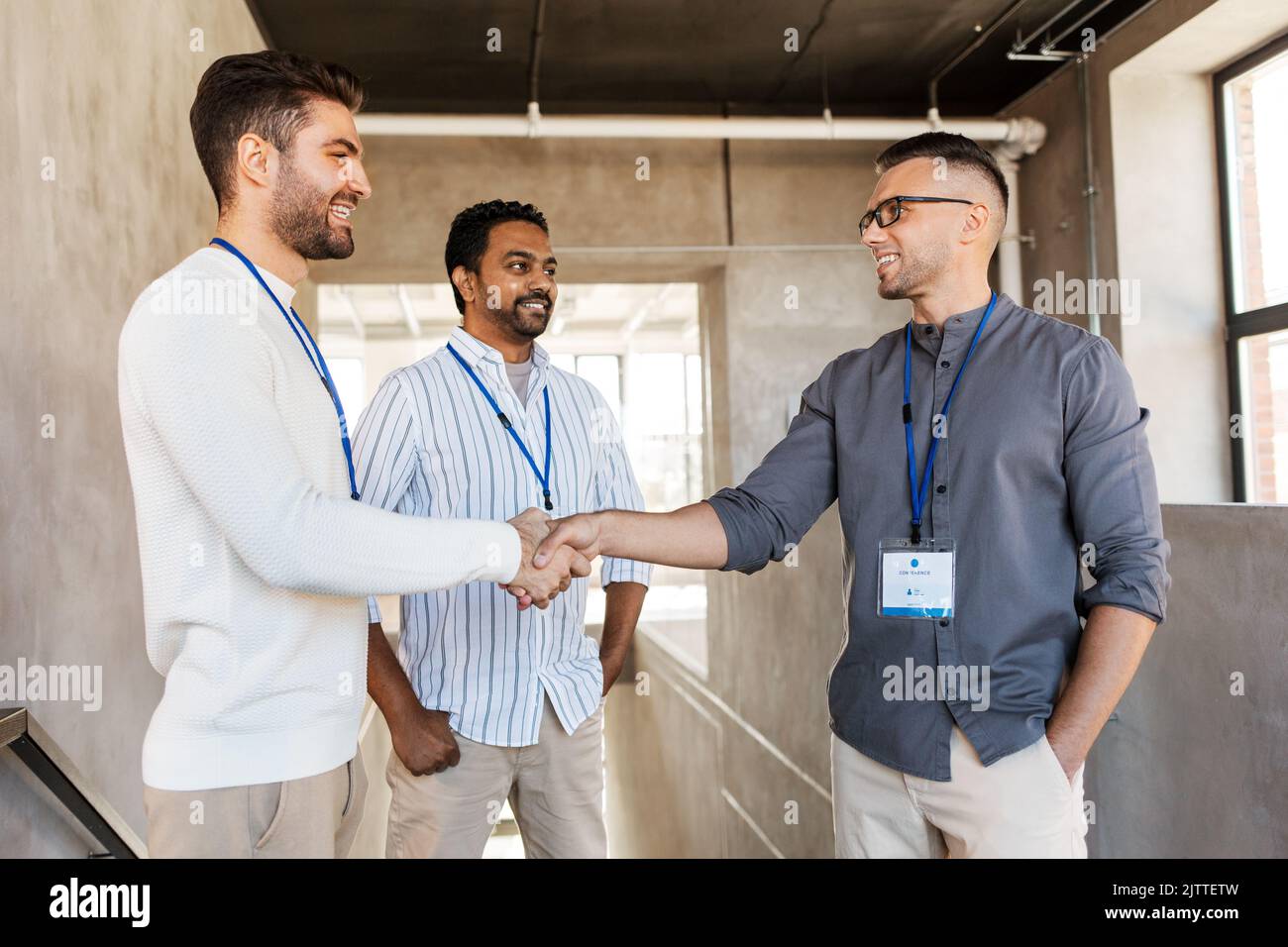 happy businessmen making handshake at office Stock Photo