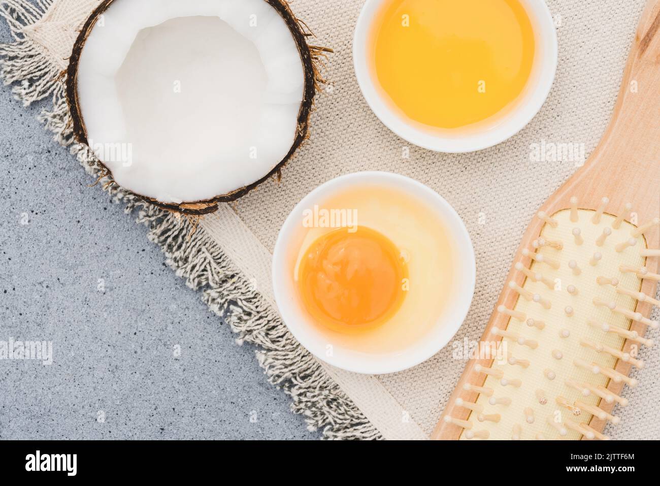 Making homemade hair mask with natural ingredients - egg yolk, honey and  coconut oil. Natural hair beauty treatment. Zero waste handmade cosmetics  Stock Photo - Alamy