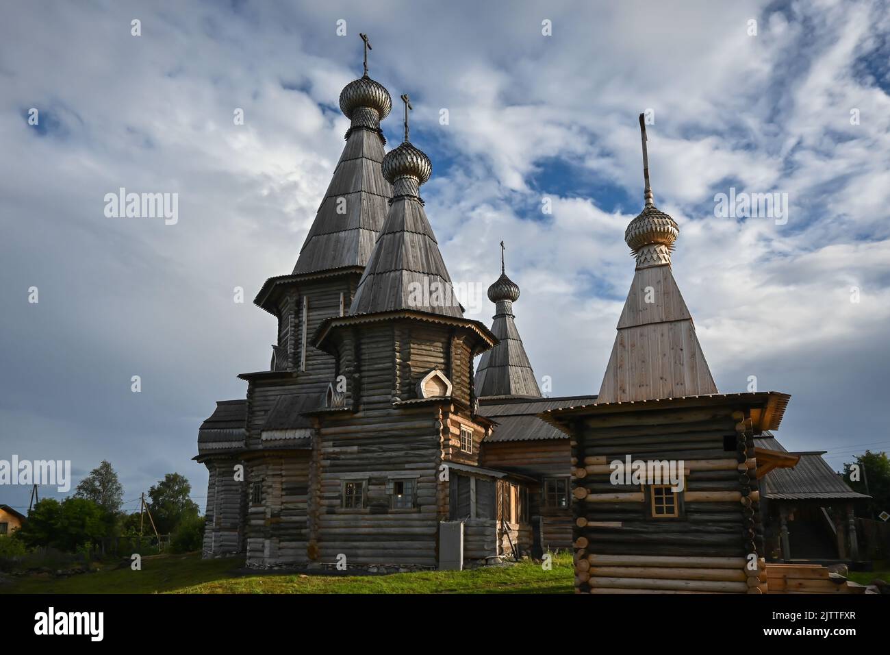 Wooden Orthodox church. Church of the Assumption of the Blessed Virgin Mary in the city of Kem, Republic of Karelia, Russia. Stock Photo