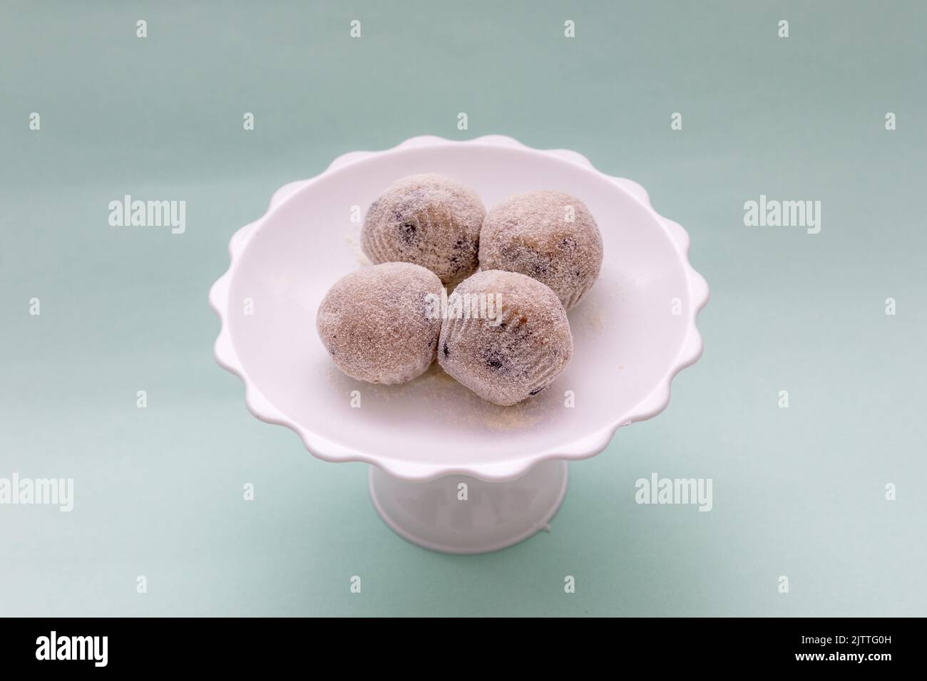 sweet known as beijinho de coco, very popular in Brazilian Stock Photo ... sweet known as beijinho de coco, very popular in Brazilian Stock Photo ...