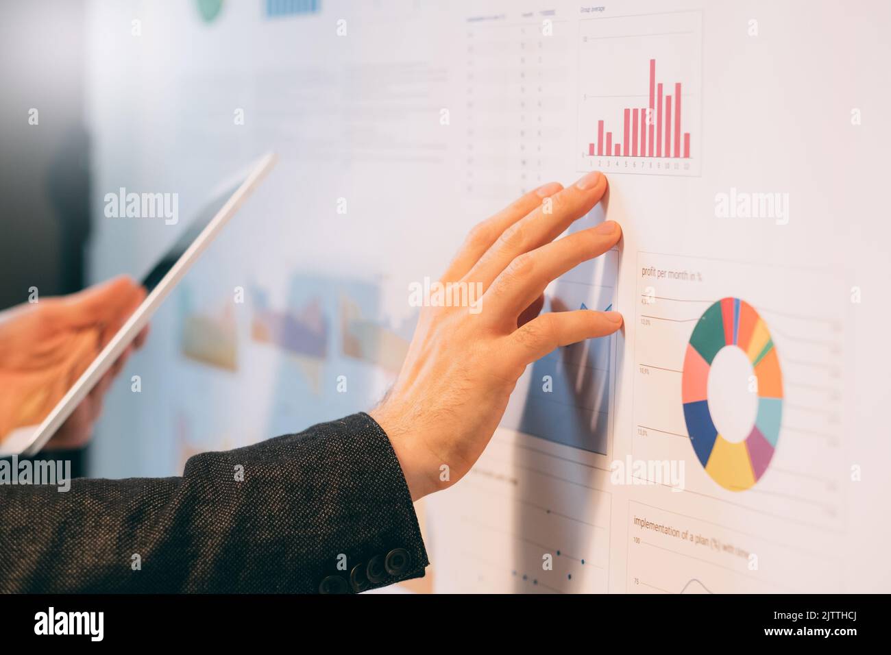 business analyst studying company growth rates Stock Photo