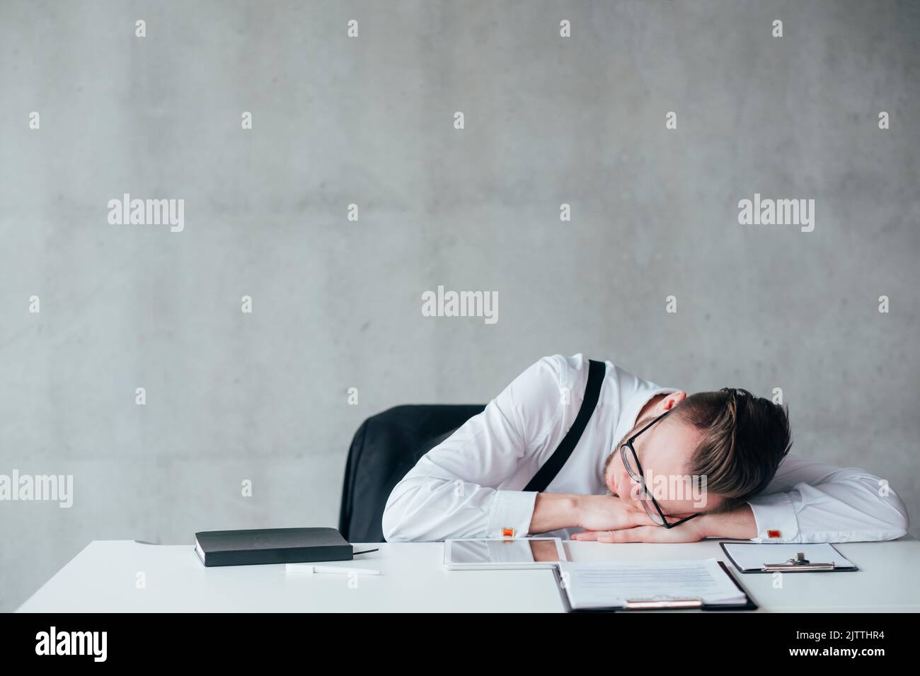 overloaded schedule routine sleeping tired guy Stock Photo