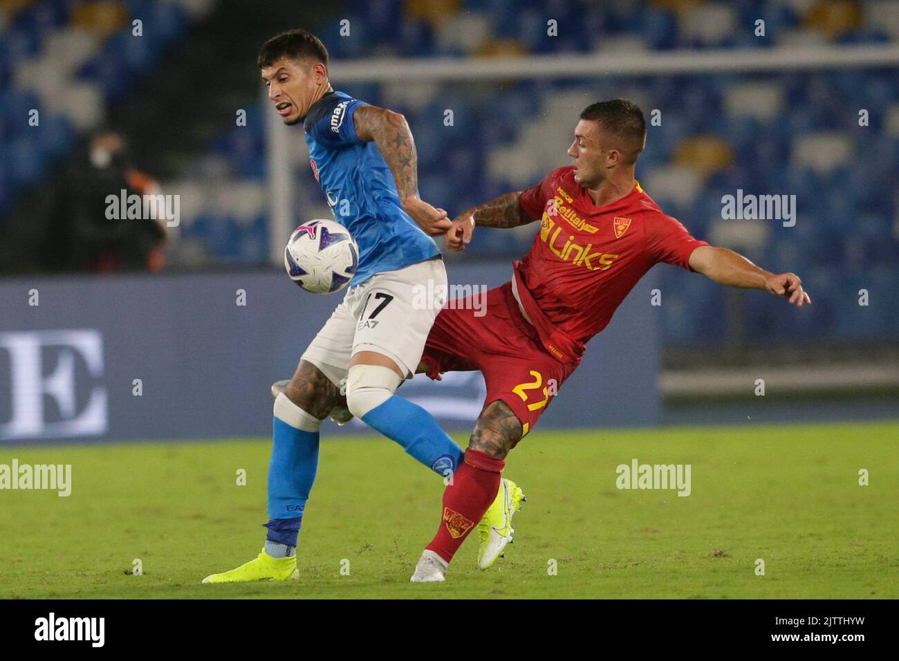 SSC Napoli's Uruguayan defender Mathias Olivera challenges for the ball with LecceÕs Brazilian forward Gabriel Strefezza  during the Serie A football match between SSC Napoli and Lecce. SSC Napoli and Lecce  draw 1-1. Stock Photo