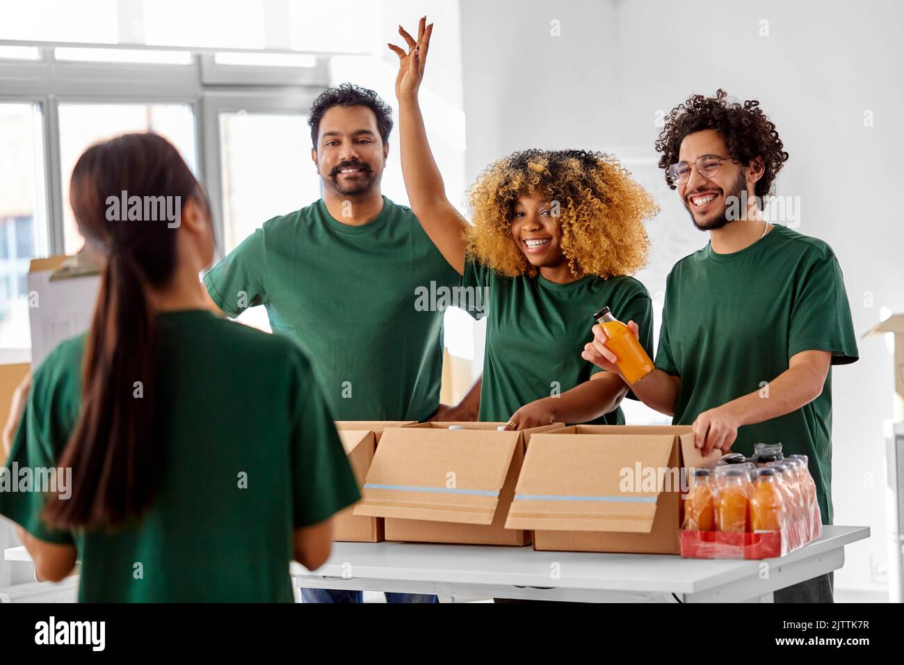 Male worker packing meal in hi-res stock photography and images - Alamy