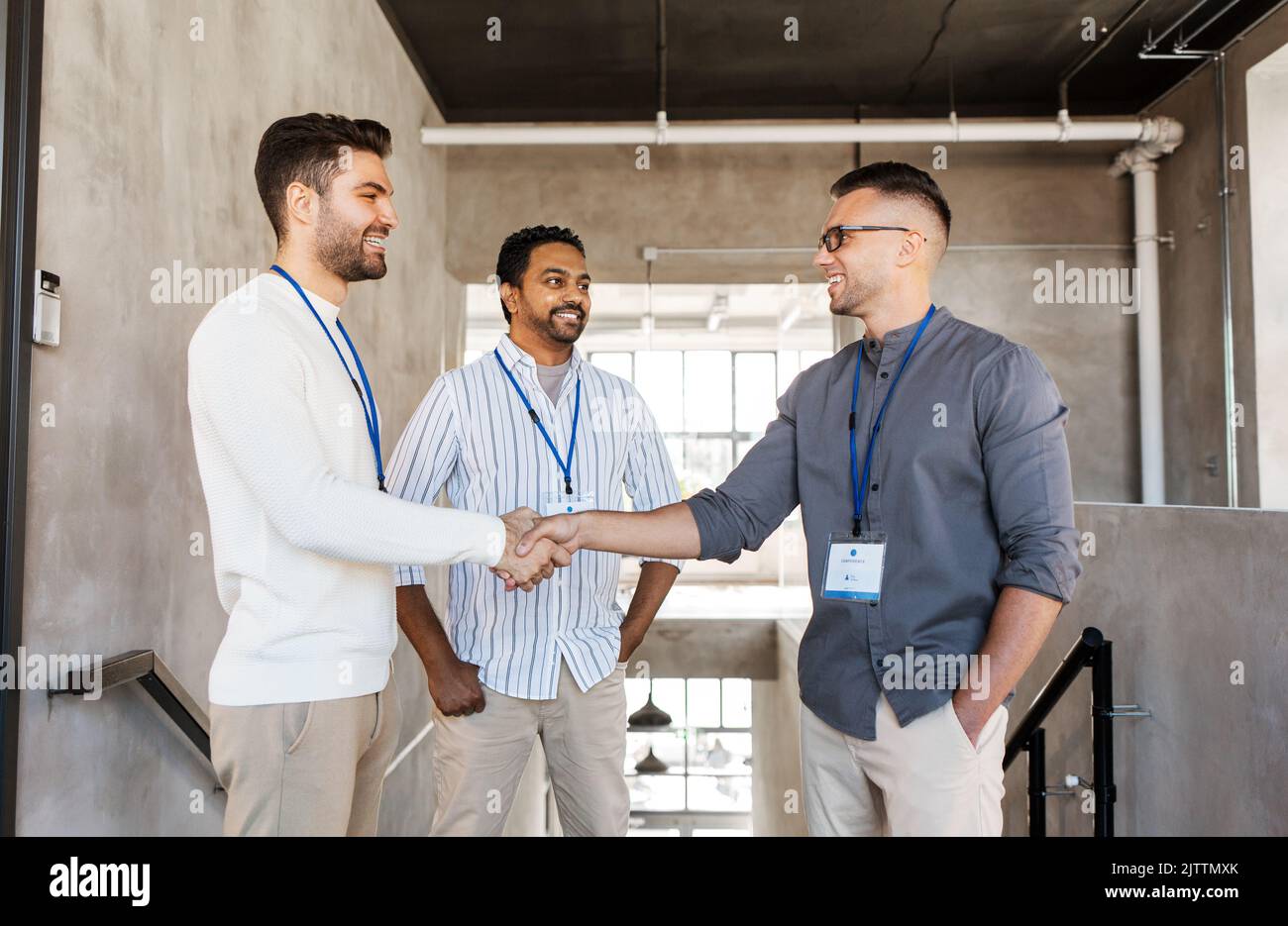 happy businessmen making handshake at office Stock Photo