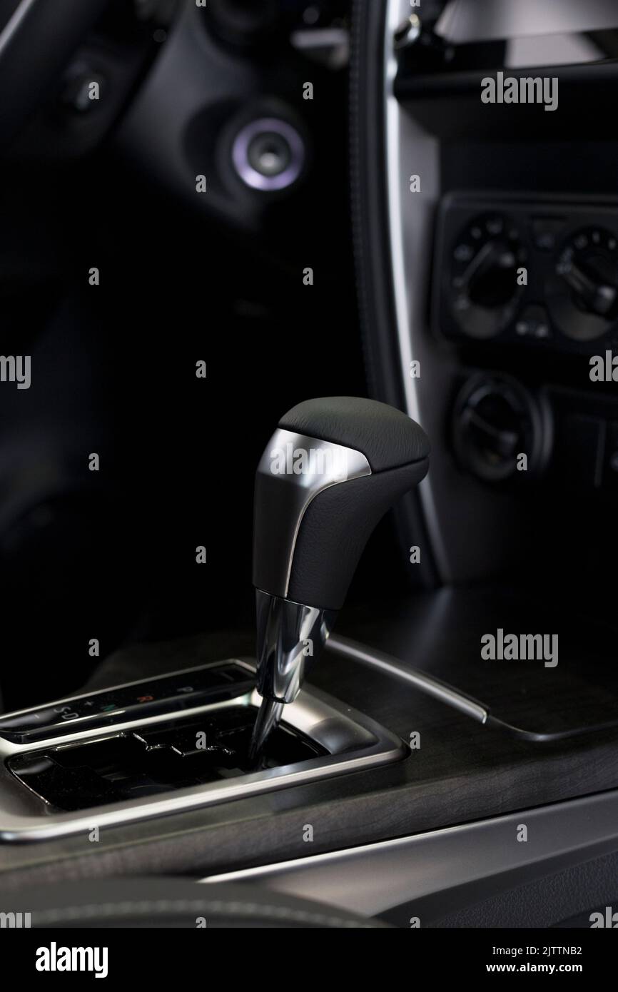Interior of new unknown car with automatic transmission in dealer showroom. Modern transportation. Stock Photo
