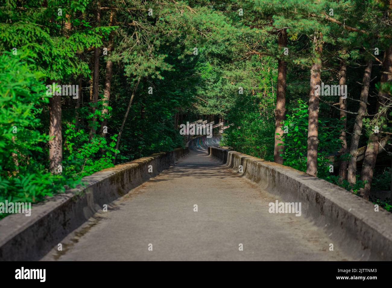 View of Abandoned or deserted remains of former bobsleigh track in Sarajevo, for the 1984 winter games. Stock Photo