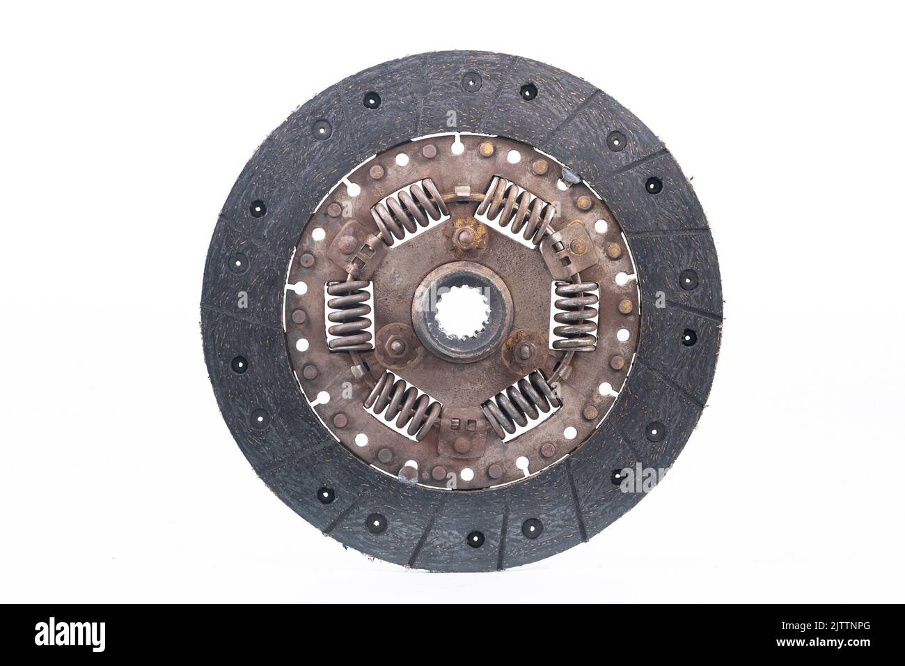Old and worn clutch plate disc viewed from different angles. Clutch