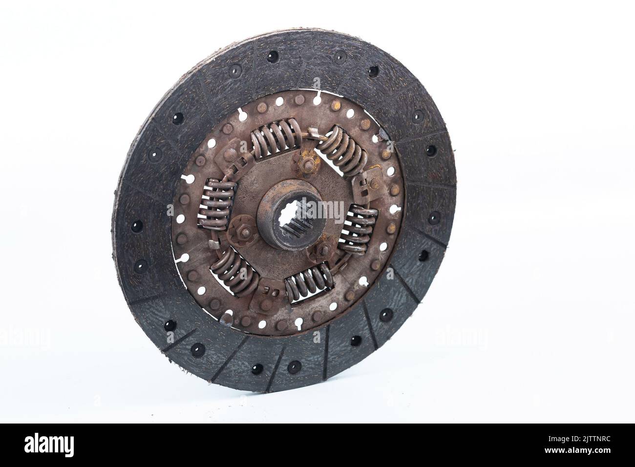 Old and worn clutch plate disc viewed from different angles. Clutch