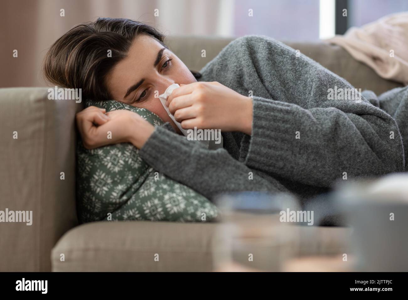 Sad woman crying tissue hi-res stock photography and images - Alamy