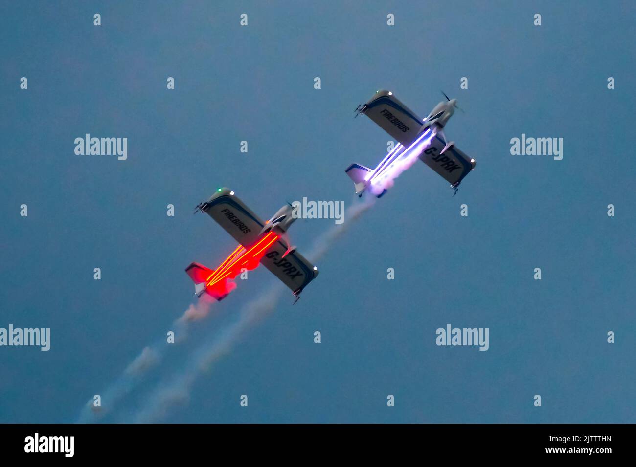 Bournemouth, Dorset, UK.  1st September 2022.  The Firebirds lit with neon lights performing during the night air display at dusk on the first day of the Bournemouth Air Festival at Bournemouth in Dorset. Picture Credit: Graham Hunt/Alamy Live News Stock Photo