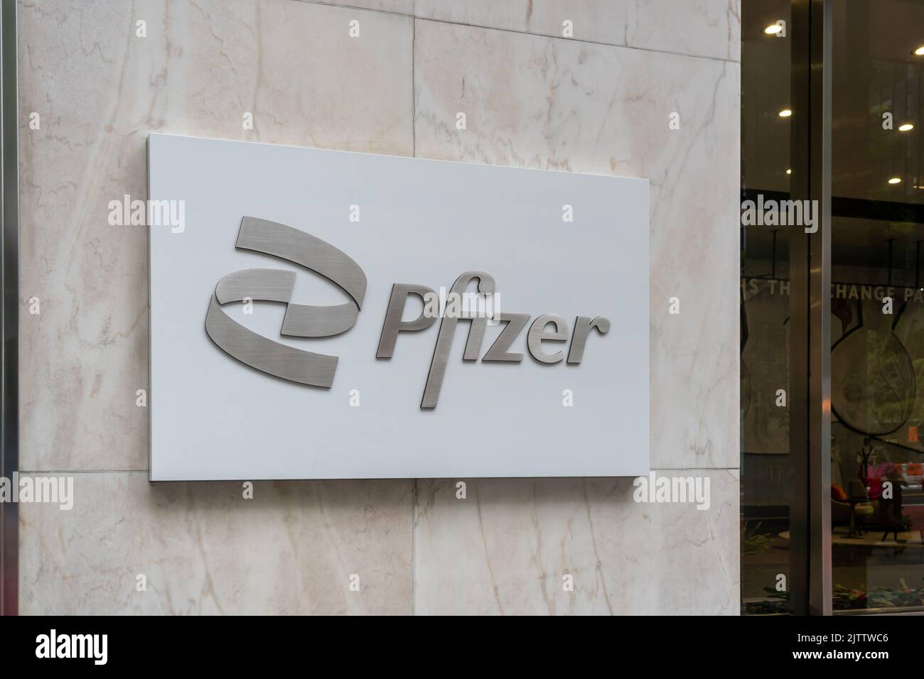 New York City, NY, USA - August 22, 2022: The entrance to Pfizer world headquarters in New York City, USA. Stock Photo