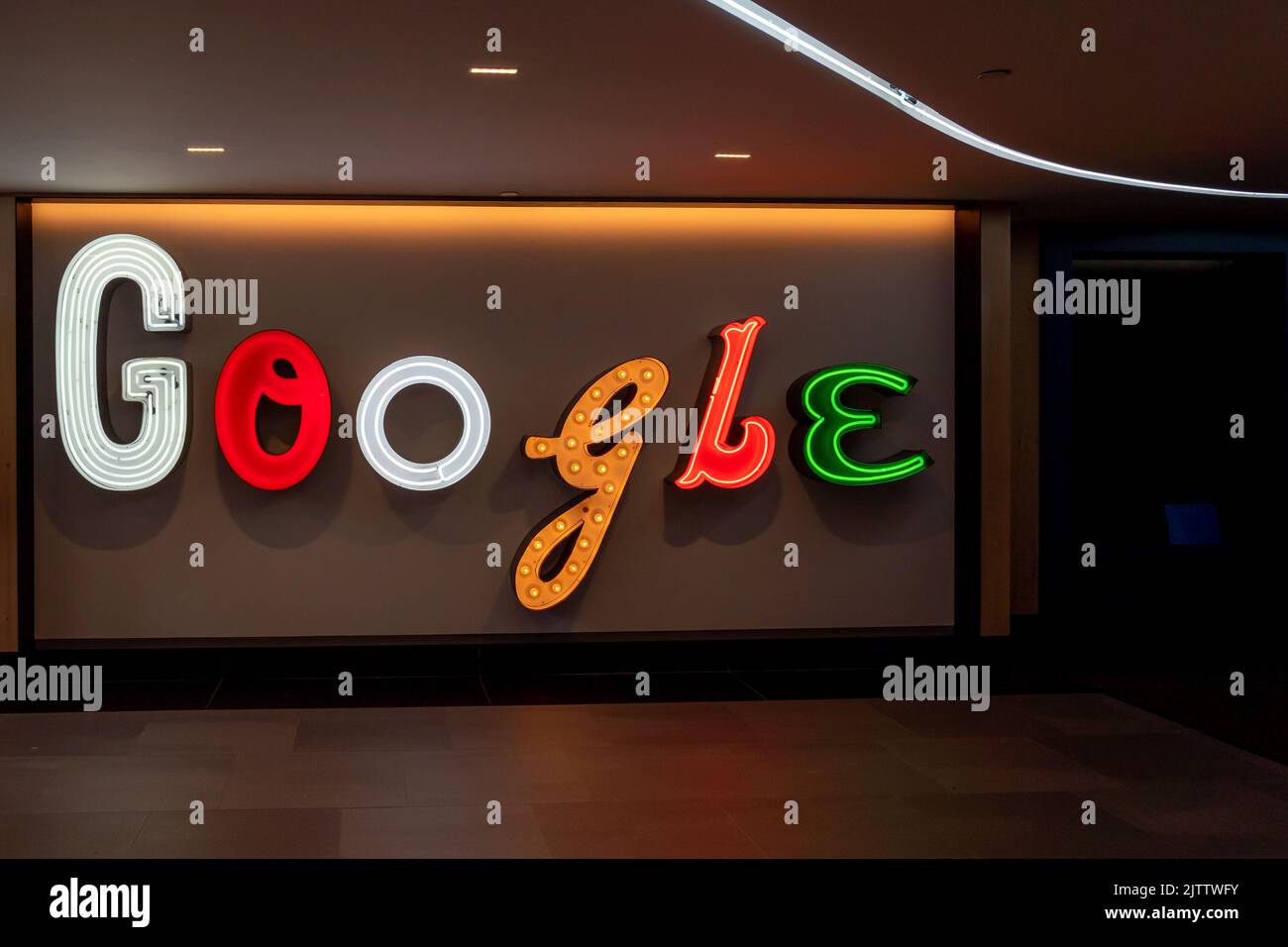 New York City, NY, USA - August 22, 2022: Close up of Google sign is seen in its office building in New York City, USA, August 22, 2022. Stock Photo