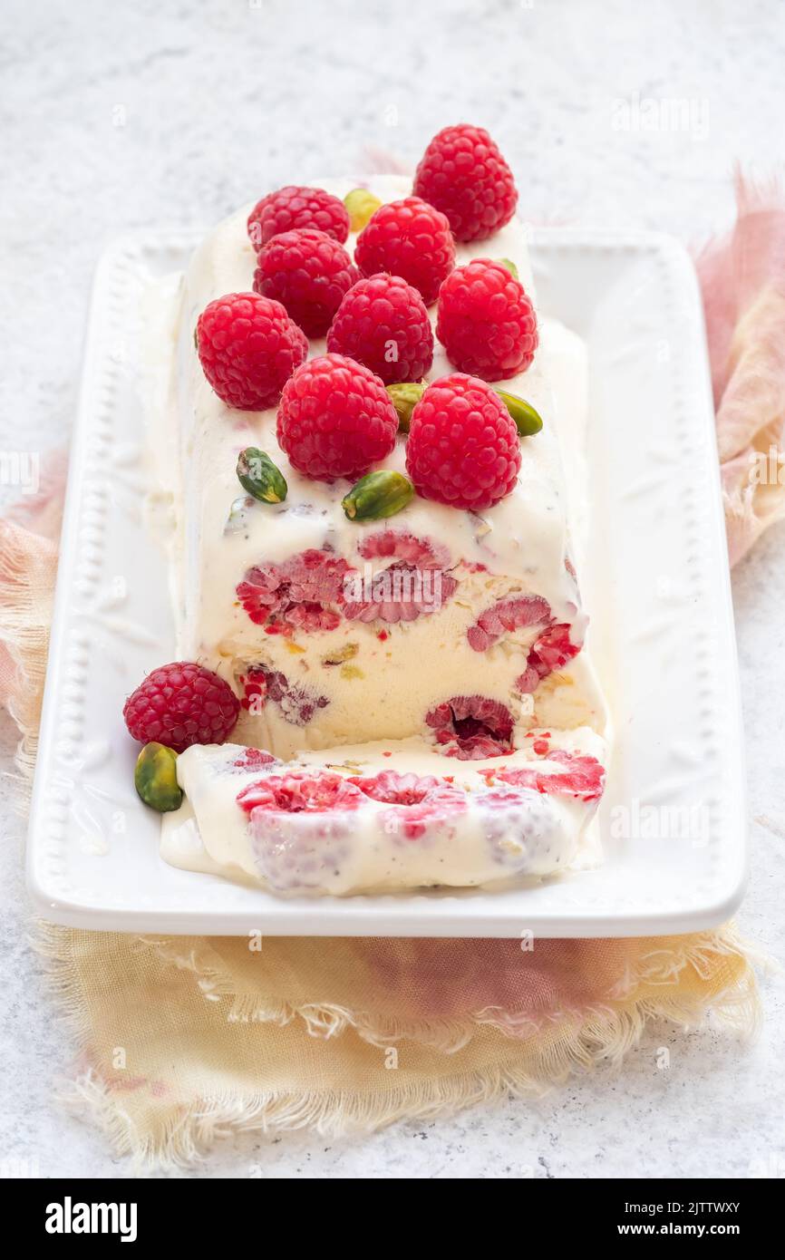 semifreddo with raspberry and pistachios Stock Photo