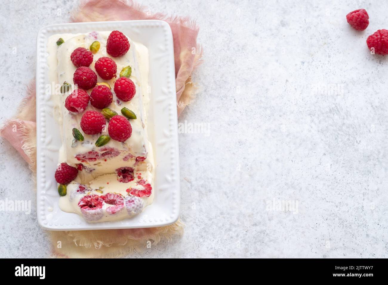 semifreddo with raspberry and pistachios Stock Photo