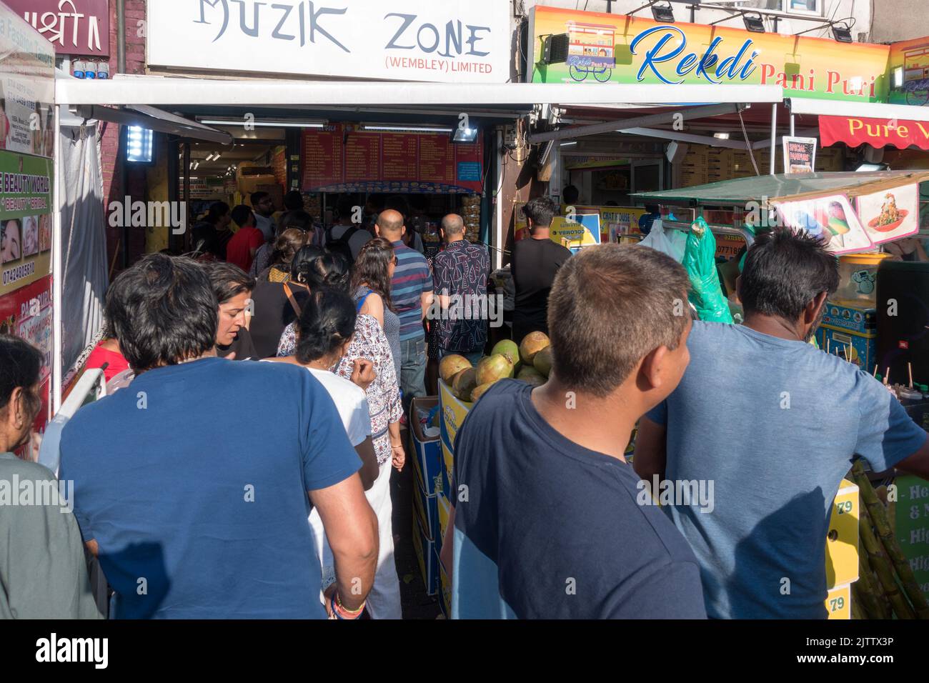 Long queue in Indian street food area in Wembley Stock Photo