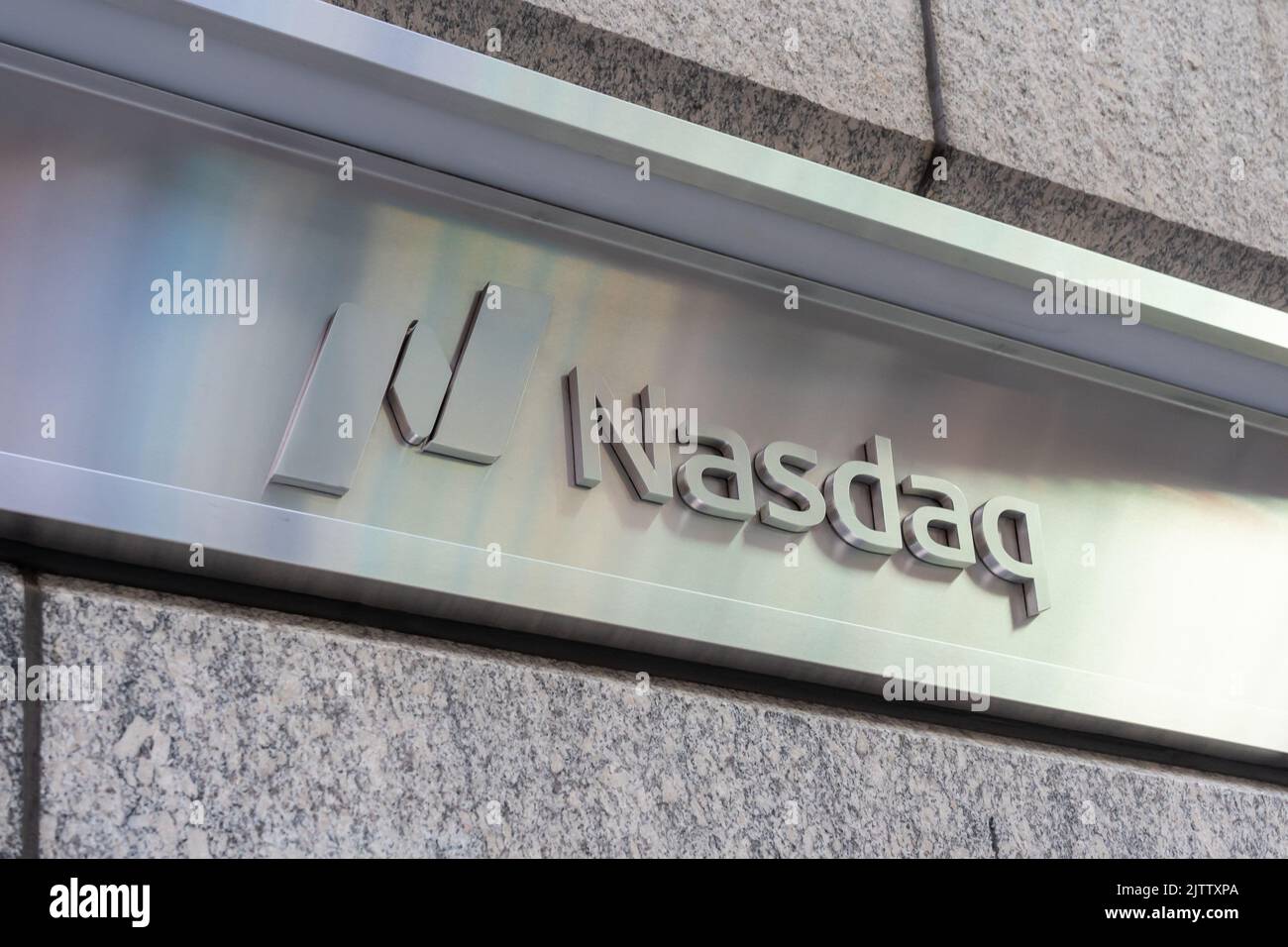New York, NY, USA - August 18, 2022: The Nasdaq sign is seen at its headquarters in New York, NY, USA, August 18, 2022. Stock Photo