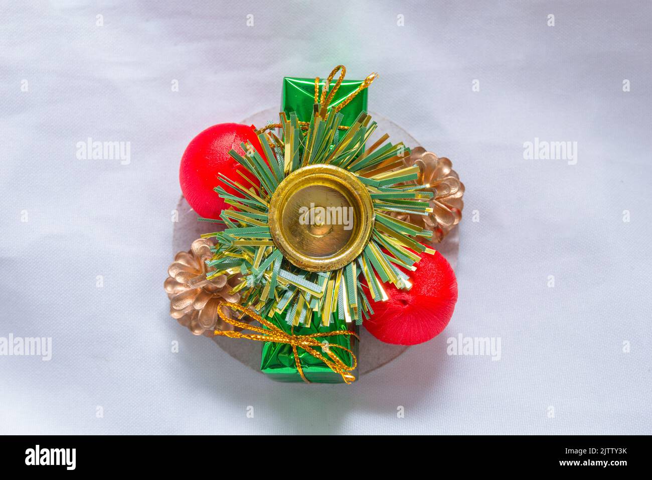 Christmas-themed candle holder on a white background in Rio de Janeiro. Stock Photo