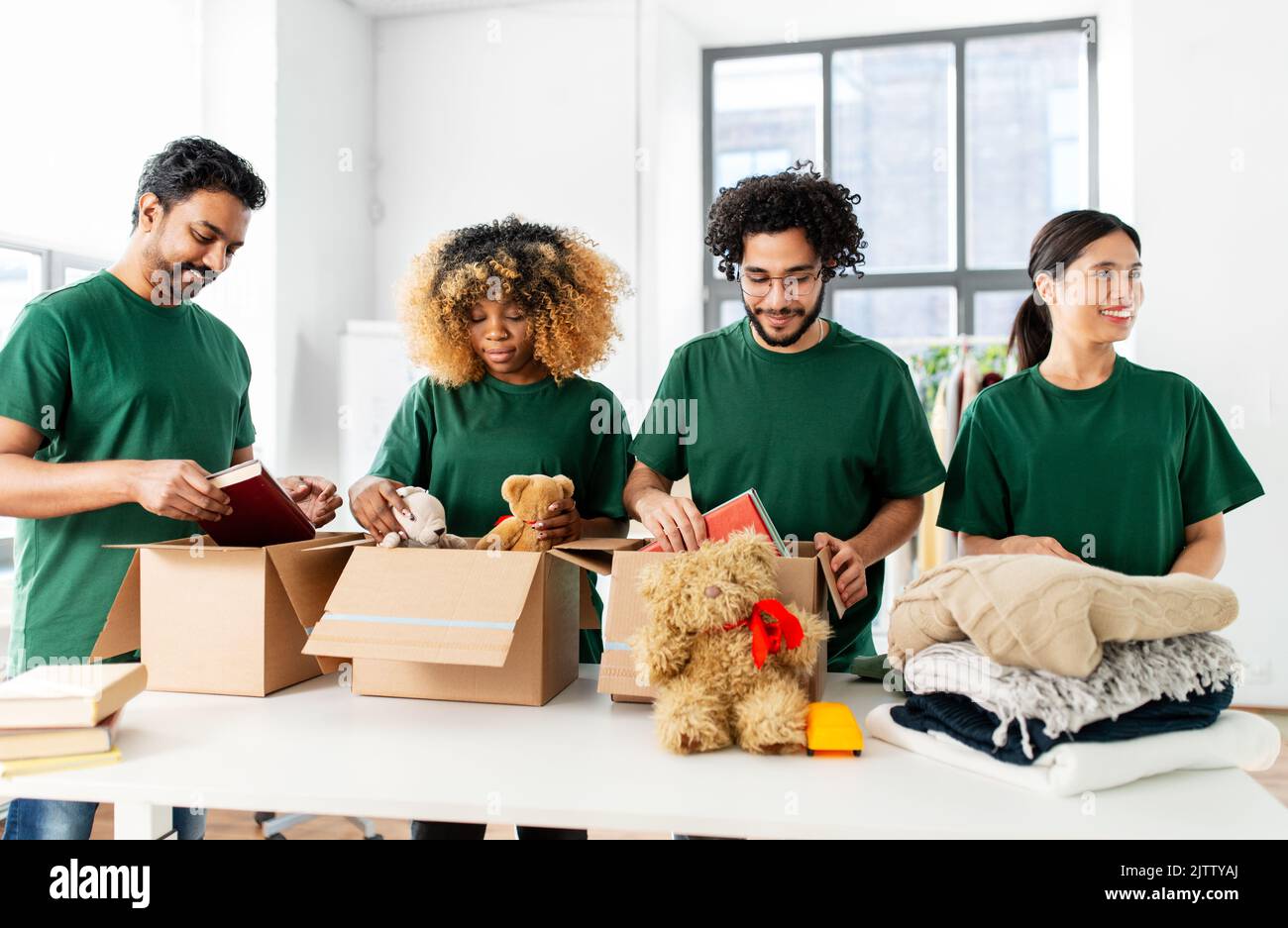 Woman packing wear in box hi-res stock photography and images - Alamy