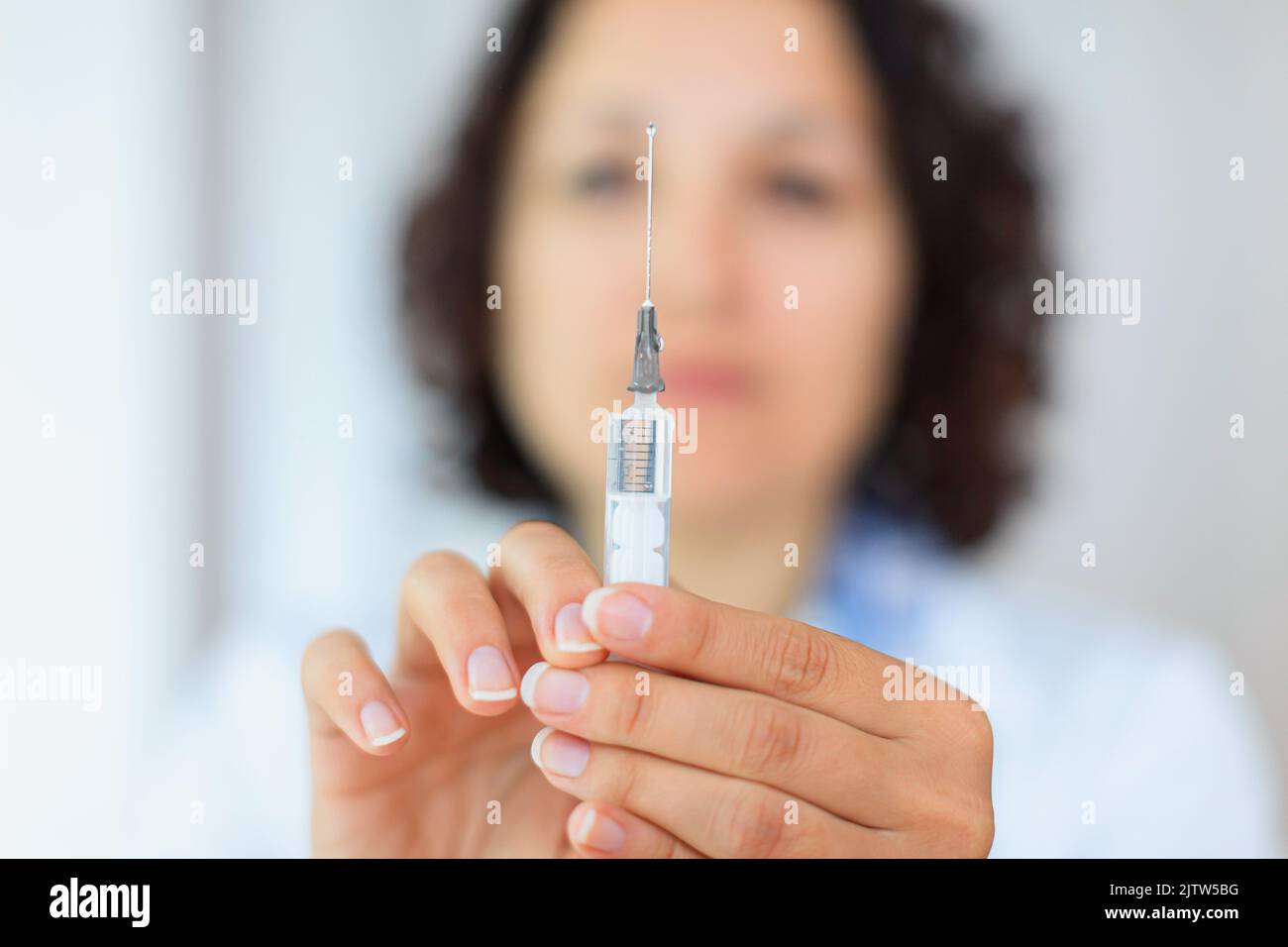 Nurse with vaccine syringe Stock Photo Alamy