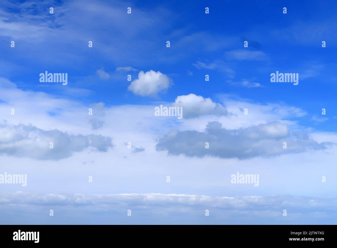 Blue cloudy sky Stock Photo - Alamy