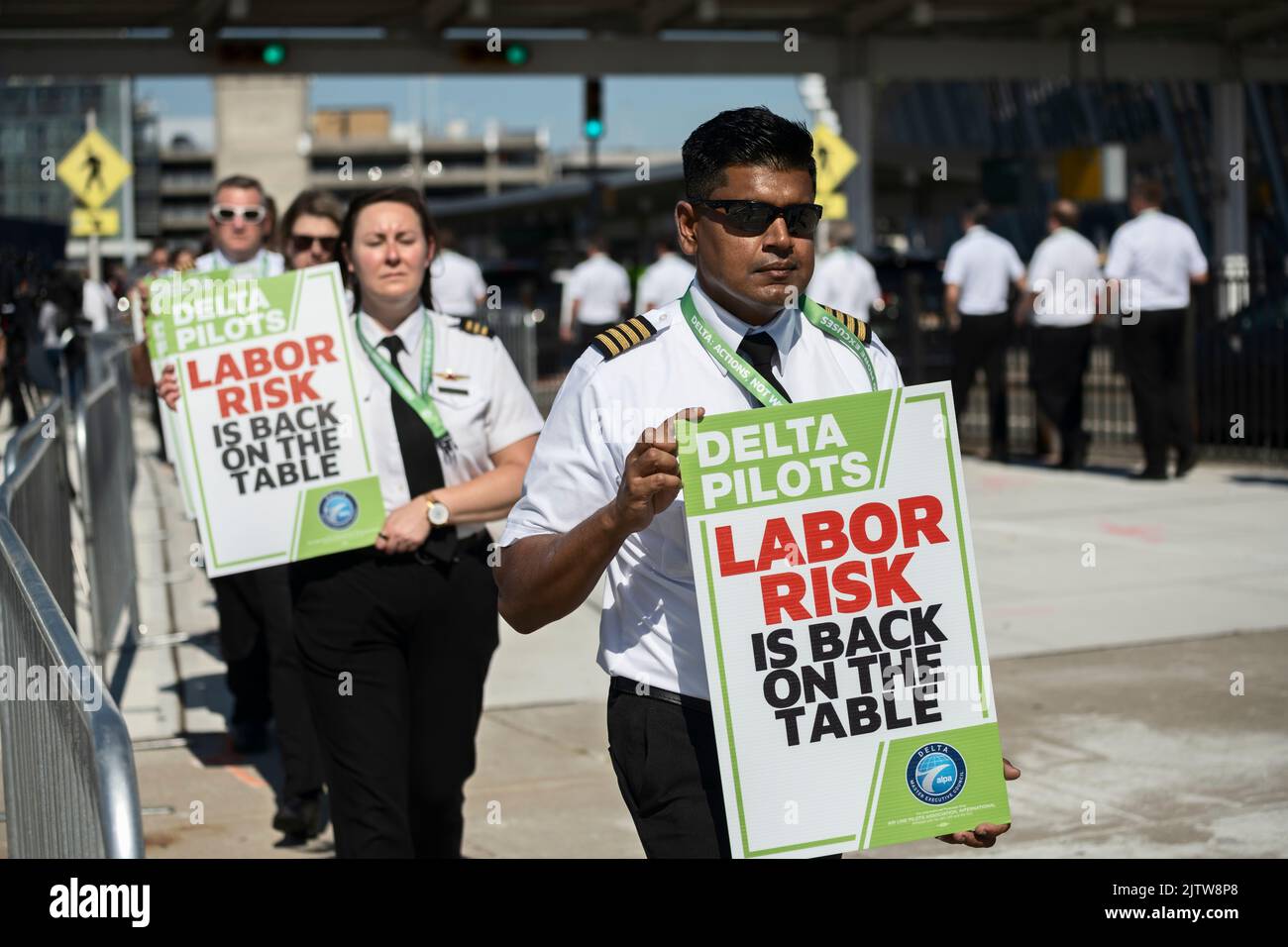 Queens, New York, USA 1st September, 2022 On Thursday before U.S. Labor Day holiday weekend, off-duty Delta Airlines pilots, members of Air Line Pilots Association, picket outside Delta terminal at JFK Airport to protest against lengthy contract negotiations which began in April 2019 and were paused for two years during pandemic, resuming in January of 2022. ALPA says pilots have been flying “historic levels of overtime” due to return of travel demand and said it was picketing at at least one dozen U.S. airports. Stock Photo