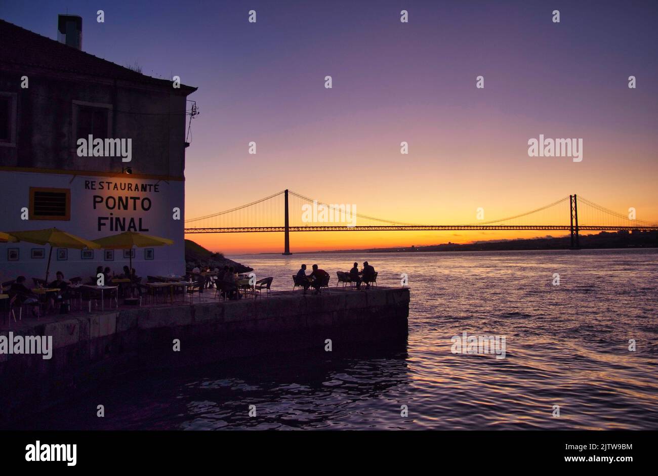 Lisbon, restaurant Ponto Final in the bay of river Targus during sunset Stock Photo