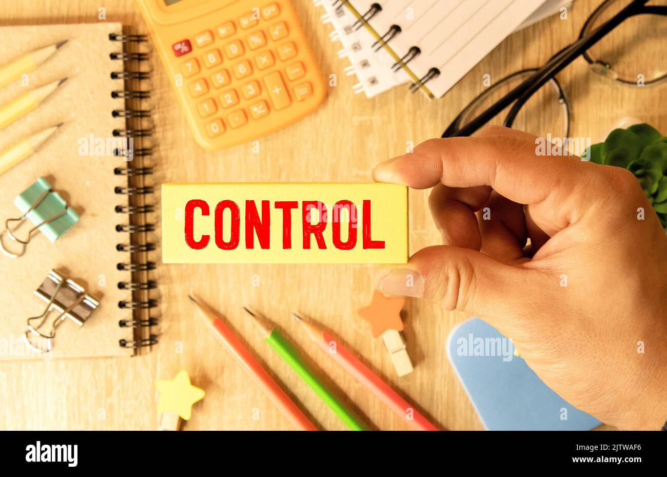 Man makes up the word Controls. Business and process management concept. Control Monitoring compliance with rules and responsibilities. Manage staff a Stock Photo