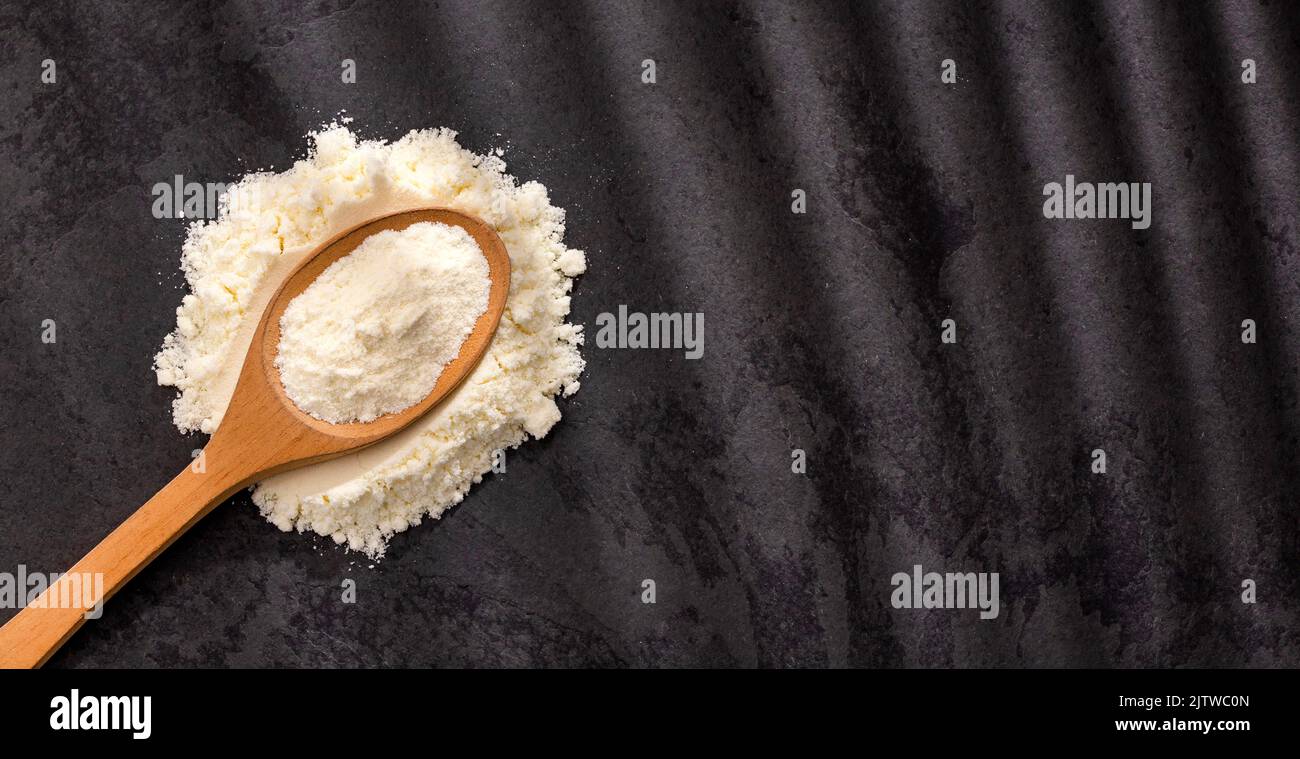 Powdered milk with nutrients in the spoon Stock Photo Alamy