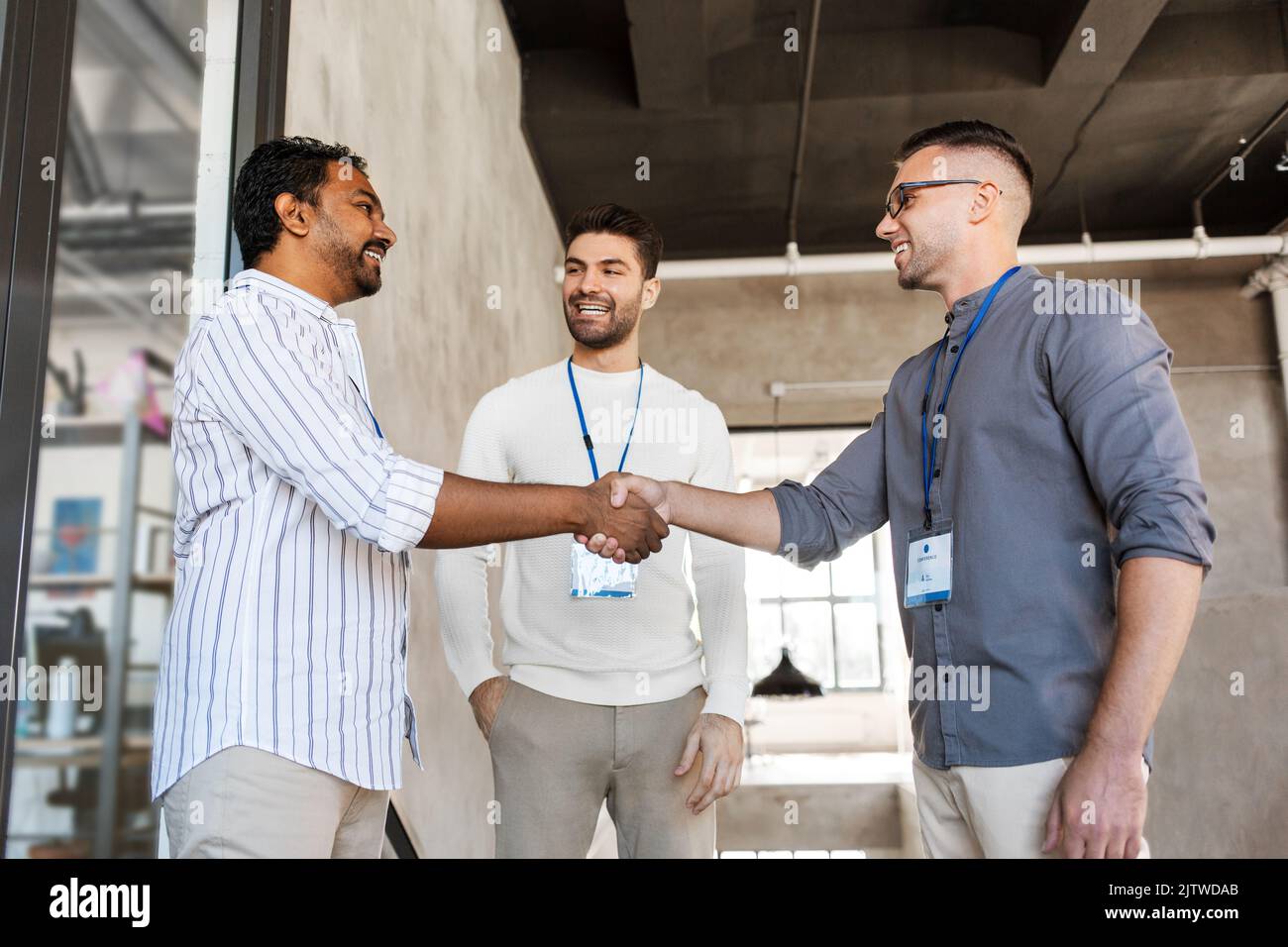 happy businessmen making handshake at office Stock Photo