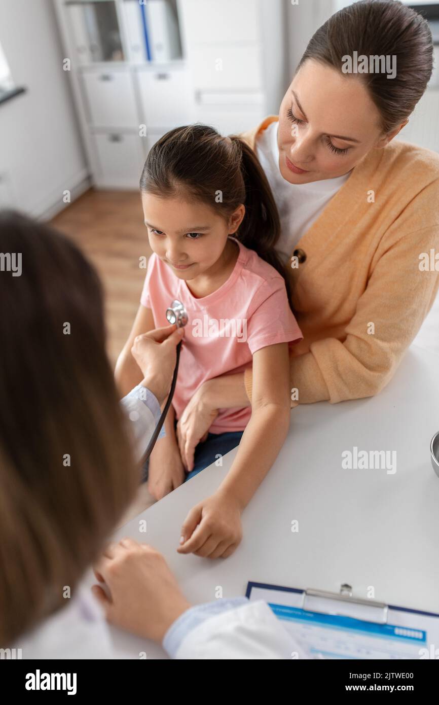 mother, girl and doctor with stethoscope at clinic Stock Photo - Alamy