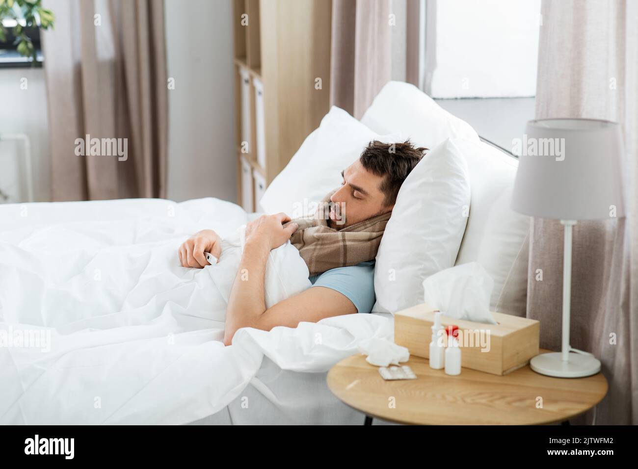 sick man sleeping in bed at home Stock Photo Alamy