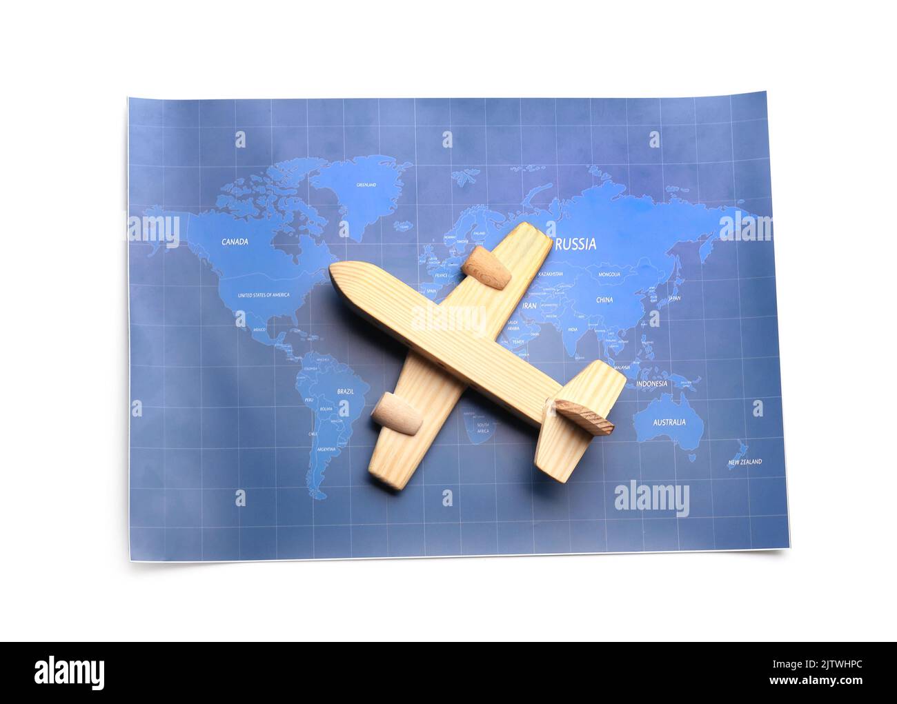 World map and wooden airplane isolated on white background Stock Photo ...