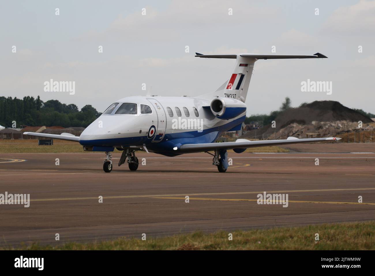 ZM335, an Embraer Phenom T.1 operated by No.45 Squadron of the Royal Air Force, arriving at RAF Fairford in Gloucestershire, England, to participate in the Royal International Air Tattoo 2022 (RIAT 2022). Stock Photo