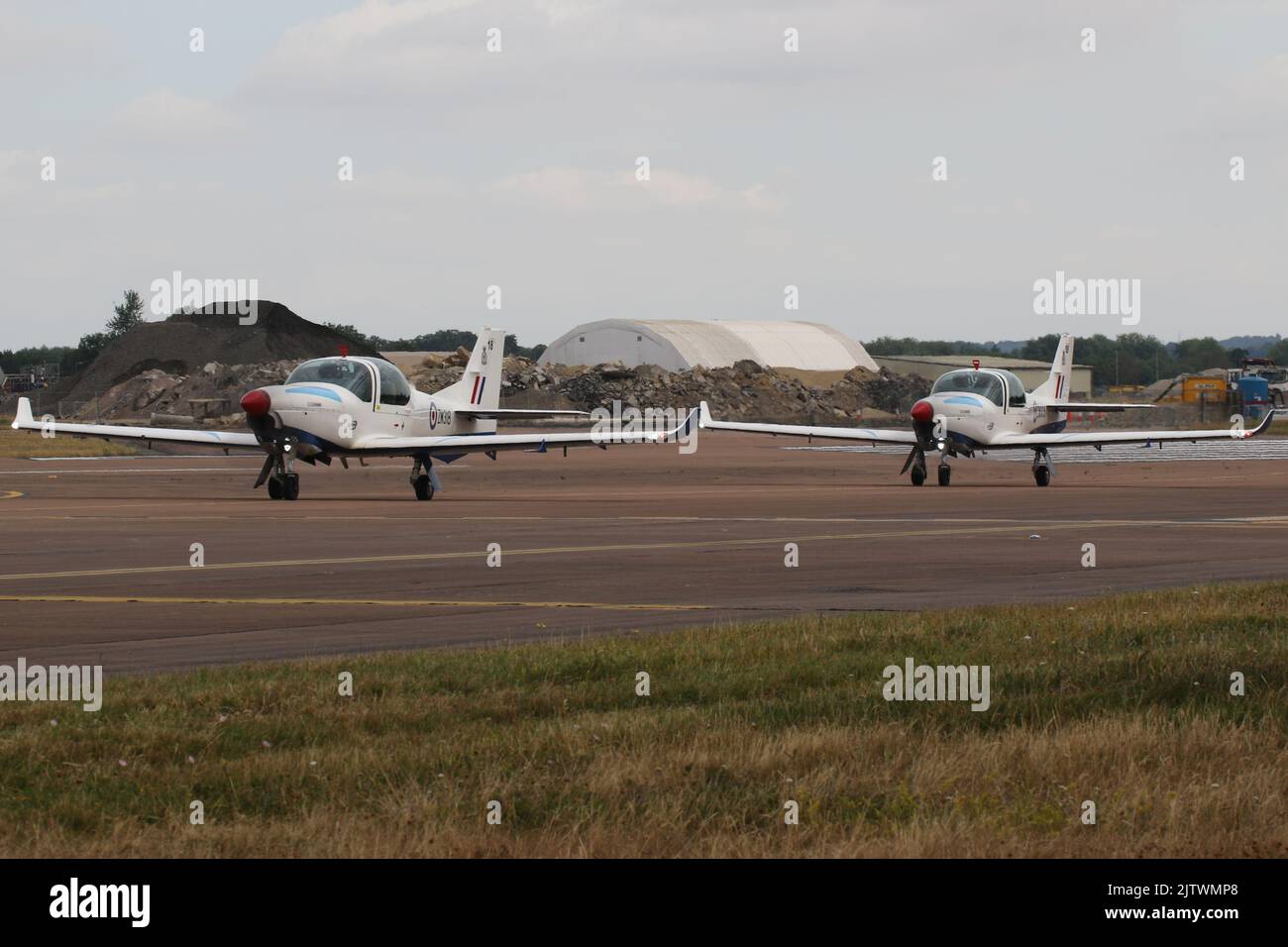 ZM318 and ZM309, two Grob Prefect T1s operated by the Royal Air Force (RAF), arriving at RAF Fairford in Gloucestershire, England, to participate in the Royal International Air Tattoo 2022 (RIAT 2022). Stock Photo