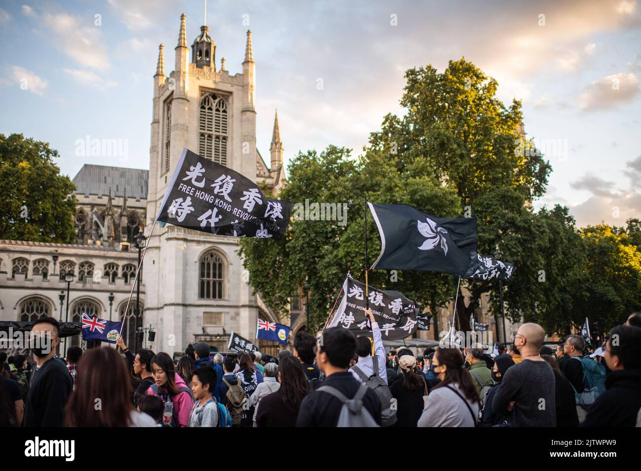 London, UK. 31st Aug, 2022. Hong Kong democracy protesters gather at Parliament Square Garden during the demonstration. Protesters gathered in London on the third anniversary of the Hong Kong police entering a metro station and beating protesters and commuters, an event that pro-democracy activists say exemplify the impunity and abuse of the Hong Kong police. Credit: SOPA Images Limited/Alamy Live News Stock Photo