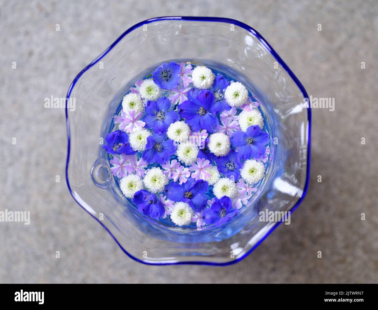 Water Ablution for Purification Filled by Flowers Stock Photo