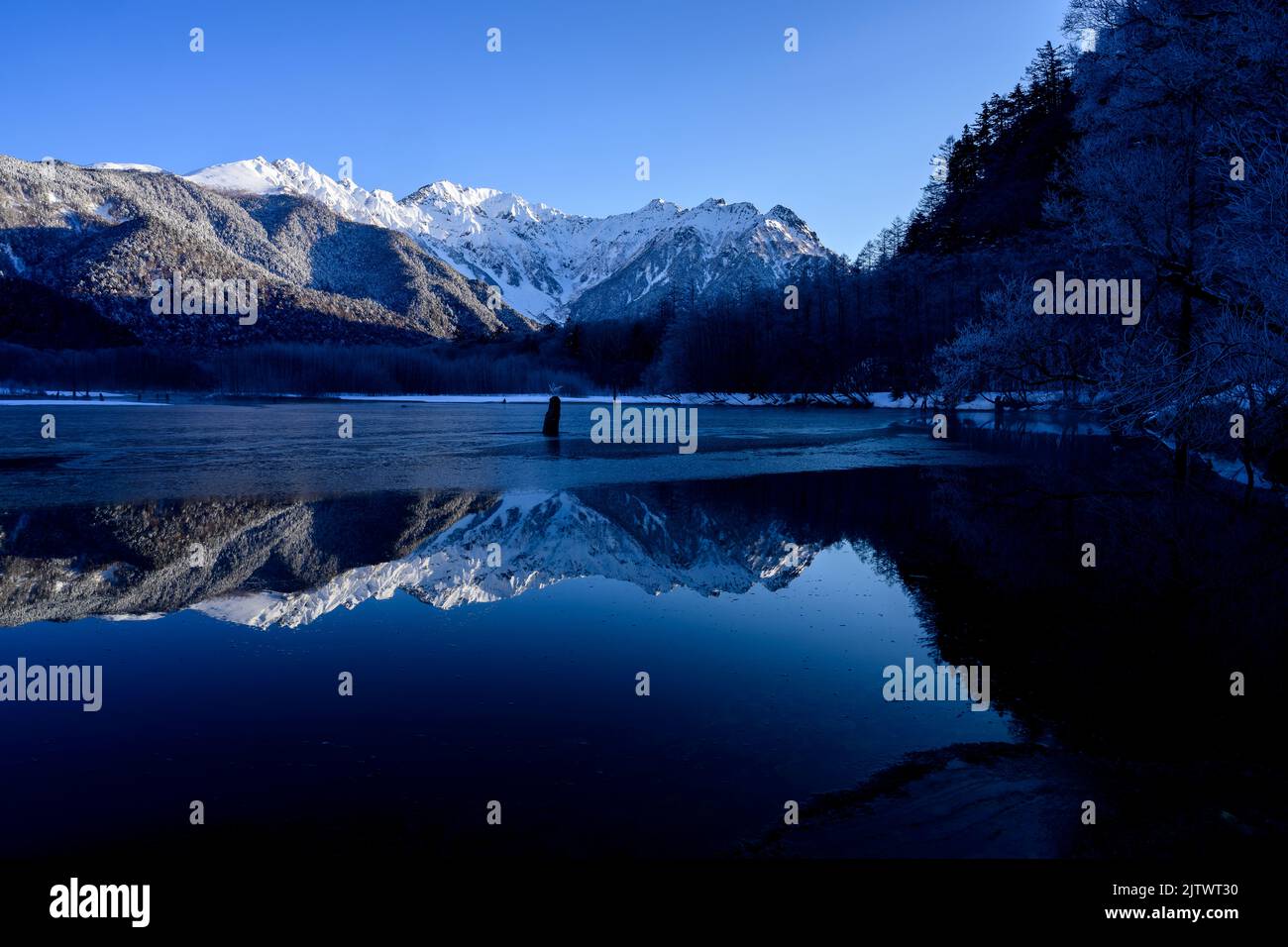 Symmetry in Snowy Landscape Stock Photo