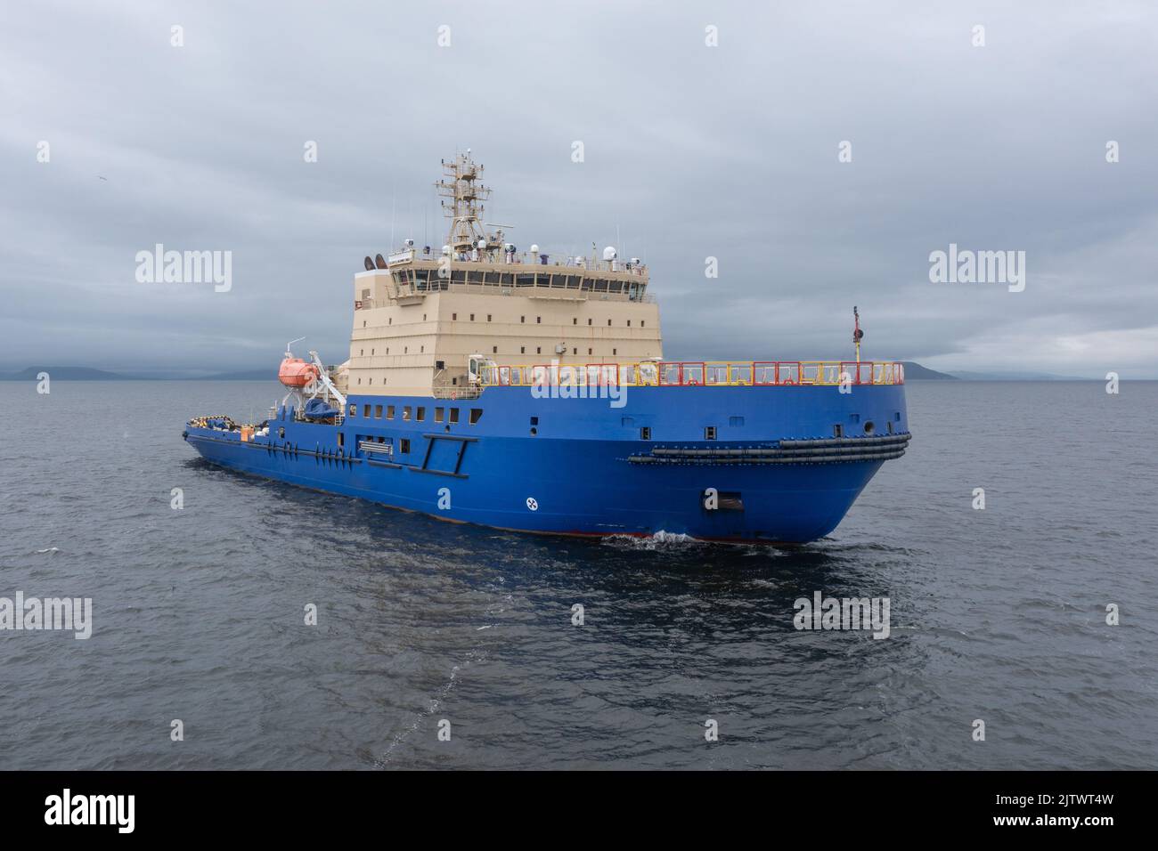 The ice breaker with a platform for helicopter landing, in the middle of a gulf. Stock Photo