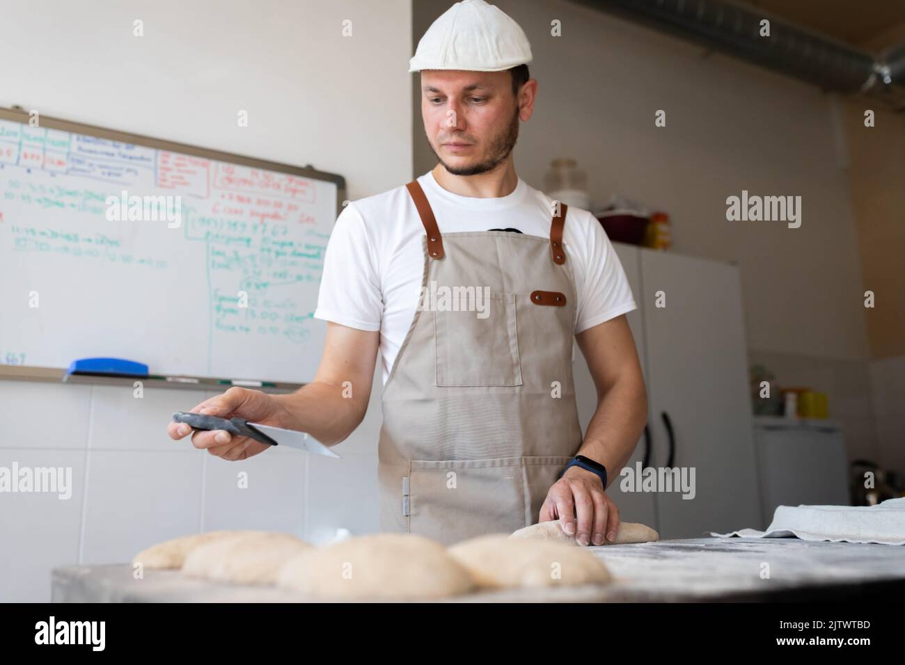 Man molding bread hi-res stock photography and images - Alamy