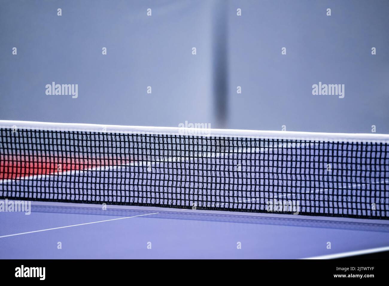 Blue and smooth surface table tennis table with tight black net to