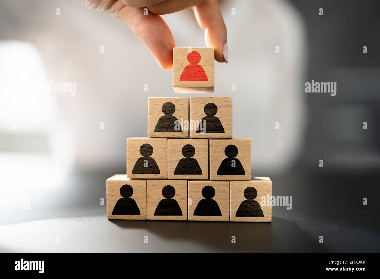 Leader Stacking Blocks. HR Leadership Concept And Recruiting Stock Photo