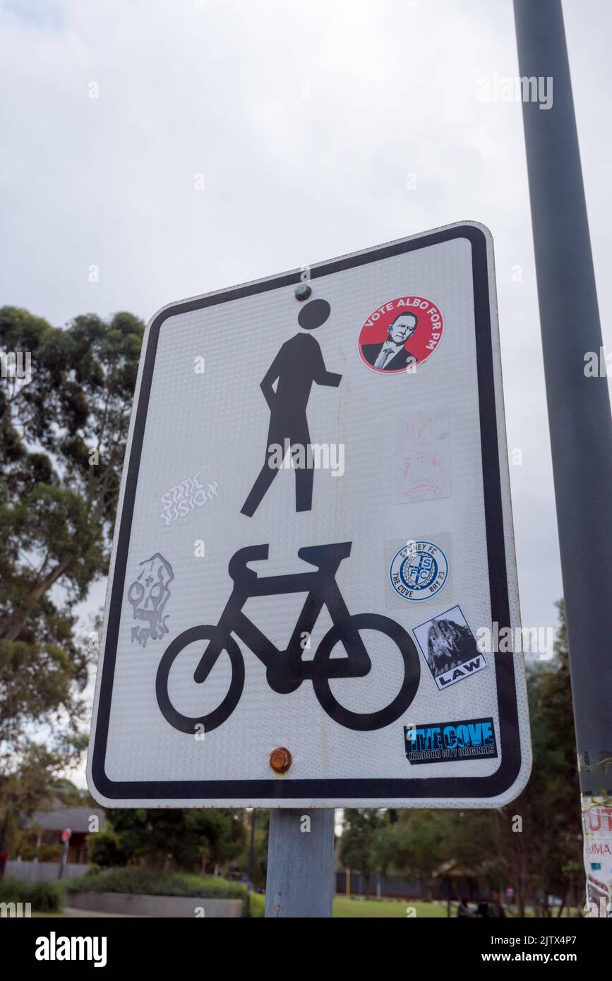 A symbol based sign, no words, indicating a shared bike or bicycle and pedestrian path in Sydney, Australia Stock Photo