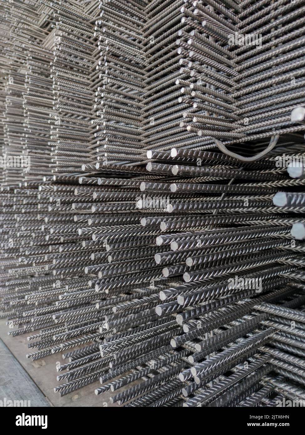 Reinforcing bars framework for armored concrete construction. Layers stacked and stowed for transport. Stock Photo
