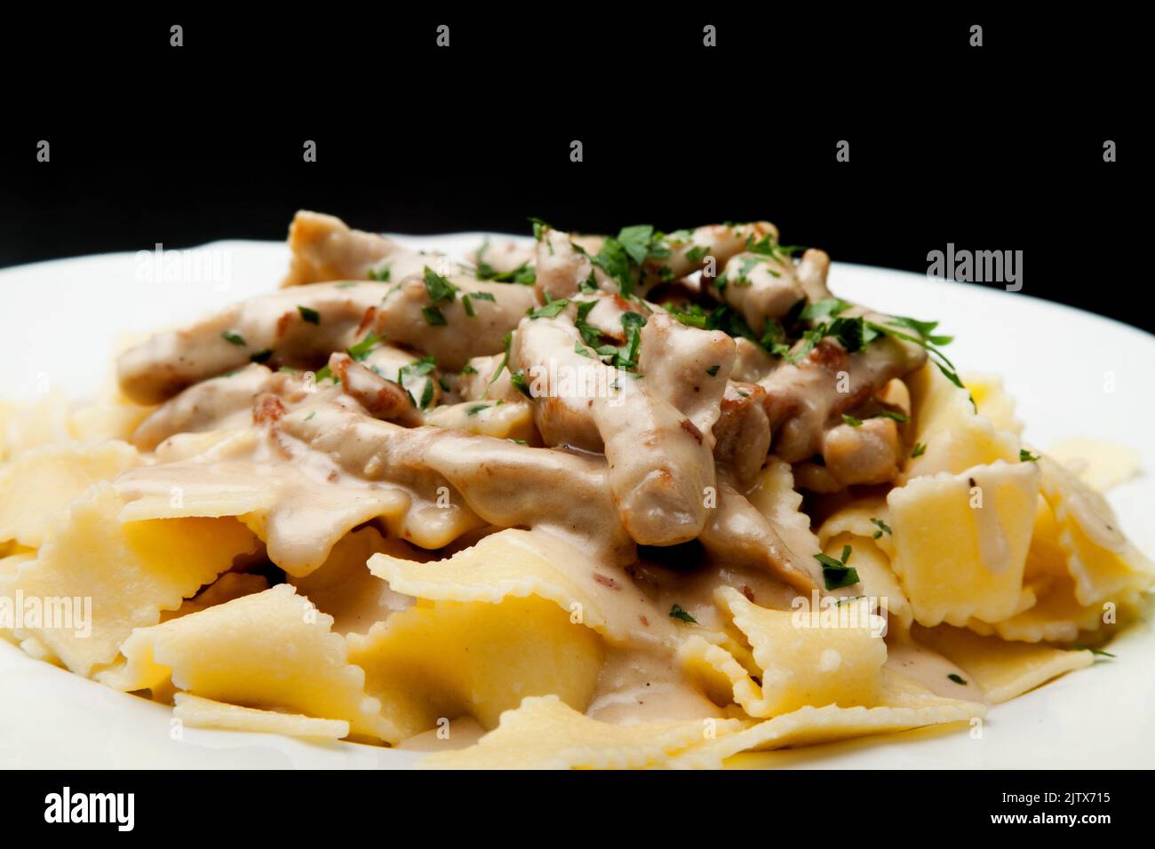 creamy tortellini pasta with chicken meat Stock Photo Alamy