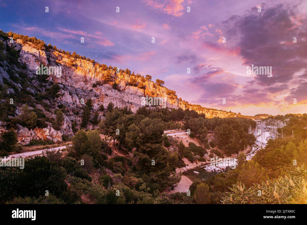 Cassis, Calanques, France. French Riviera. Beautiful Nature Of Cote De Azur On The Azure Coast Of France. Calanques - A Deep Bay Surrounded By High Stock Photo