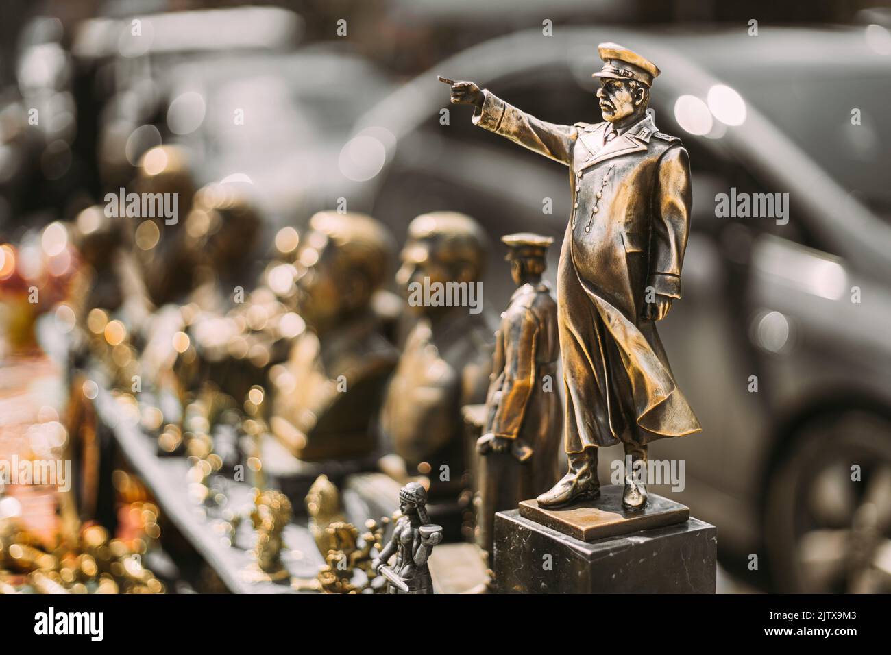 Miniature Bronze Figurines Of Joseph Stalin At Flea Market. Soviet Leader Josef Stalin. Concept Of Nostalgia For Soviet Union. Stock Photo