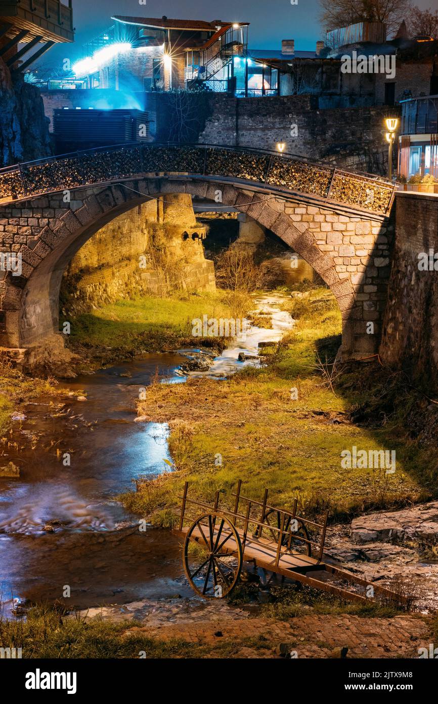 Tbilisi, Georgia, Night Scenic View Of Bridge of Love in Bath District - Is The Ancient District Of Tbilisi, Georgia. Sulfuric Baths, rvier in Stock Photo